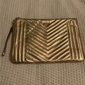 Michael kors large clutch w strap gold never used approximately 14’ x 9’